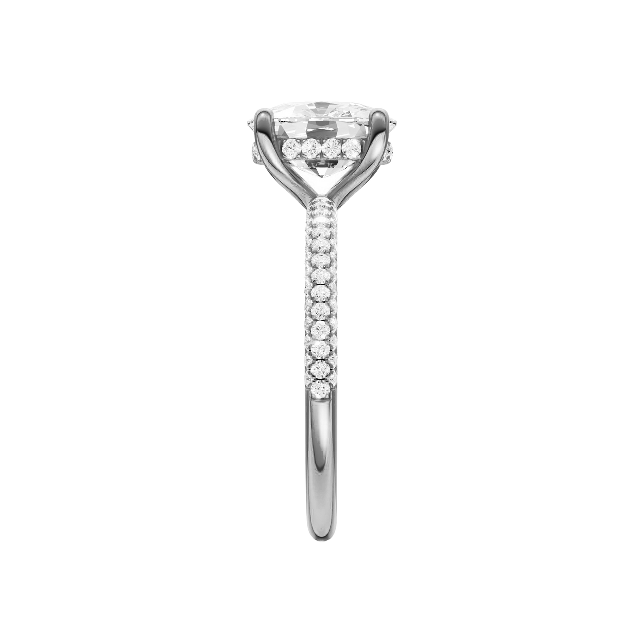A side view of the Elongated cushion cut diamond engagement ring in 14k white gold with a pavé diamond band and cathedral setting
