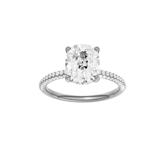A front view of the Elongated cushion cut diamond engagement ring in 14k white gold with a pavé diamond band and cathedral setting