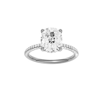 A front view of the Elongated cushion cut diamond engagement ring in 14k white gold with a pavé diamond band and cathedral setting