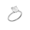 A three-quarter view of the Elongated cushion cut diamond engagement ring in 14k white gold with a pavé diamond band and cathedral setting