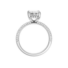 A profile view of the Emerald cut diamond engagement ring in 14k white gold with a pavé diamond band and cathedral setting