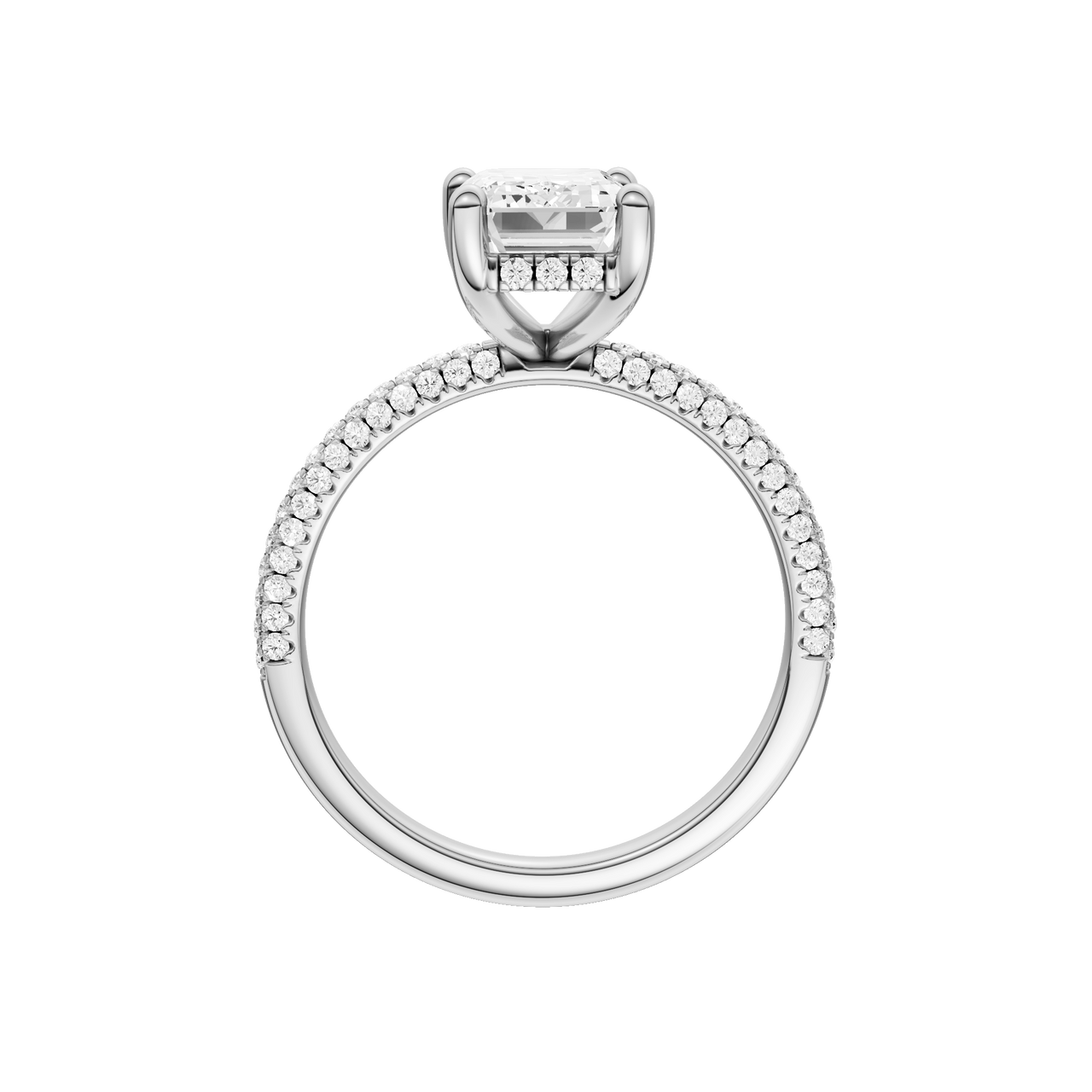 A profile view of the Emerald cut diamond engagement ring in 14k white gold with a pavé diamond band and cathedral setting