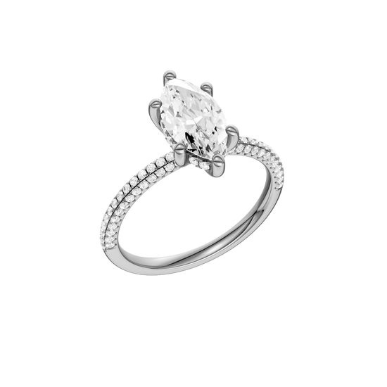 A three-quarter view of the Marquise cut diamond engagement ring in platinum with a pavé diamond band and cathedral setting