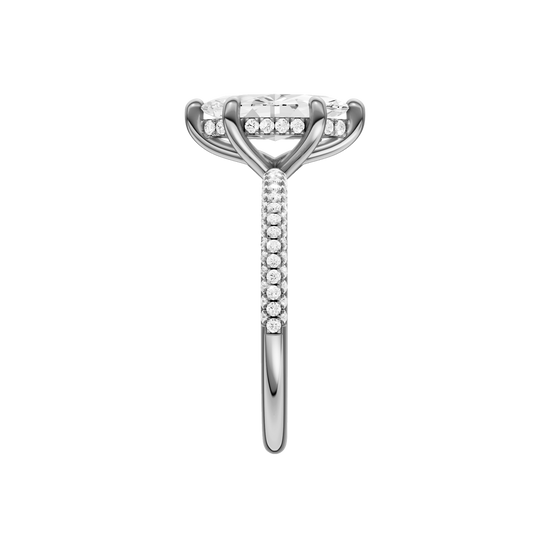 A side view of the Marquise cut diamond engagement ring in platinum with a pavé diamond band and cathedral setting