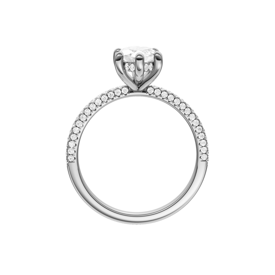 A profile view of the Marquise cut diamond engagement ring in platinum with a pavé diamond band and cathedral setting