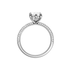 A profile view of the Marquise cut diamond engagement ring in platinum with a pavé diamond band and cathedral setting