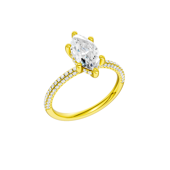 A three-quarter view of the Marquise cut diamond engagement ring in 14k white gold with a pavé diamond band and cathedral setting
