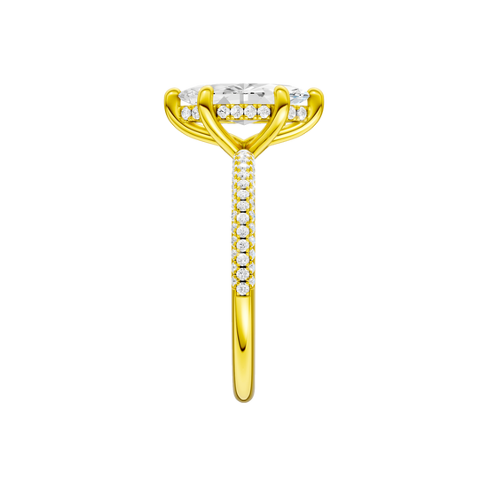 A side view of the Marquise cut diamond engagement ring in 14k white gold with a pavé diamond band and cathedral setting
