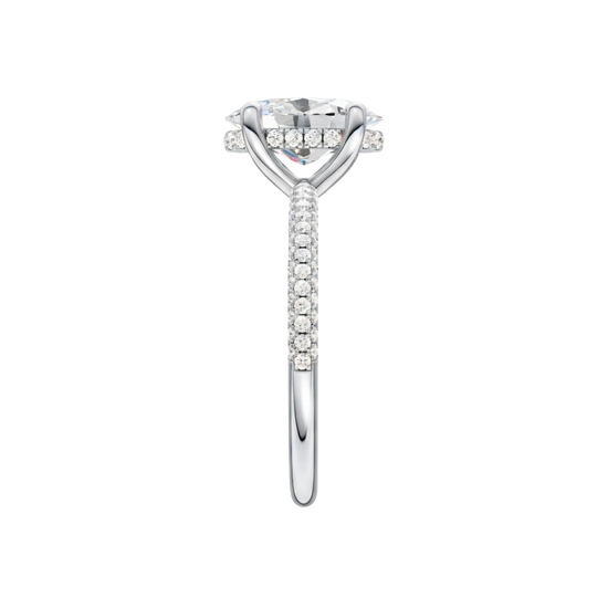 A side view of the Oval cut diamond engagement ring in platinum with a pavé diamond band and cathedral setting