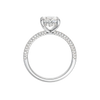 A profile view of the Oval cut diamond engagement ring in platinum with a pavé diamond band and cathedral setting