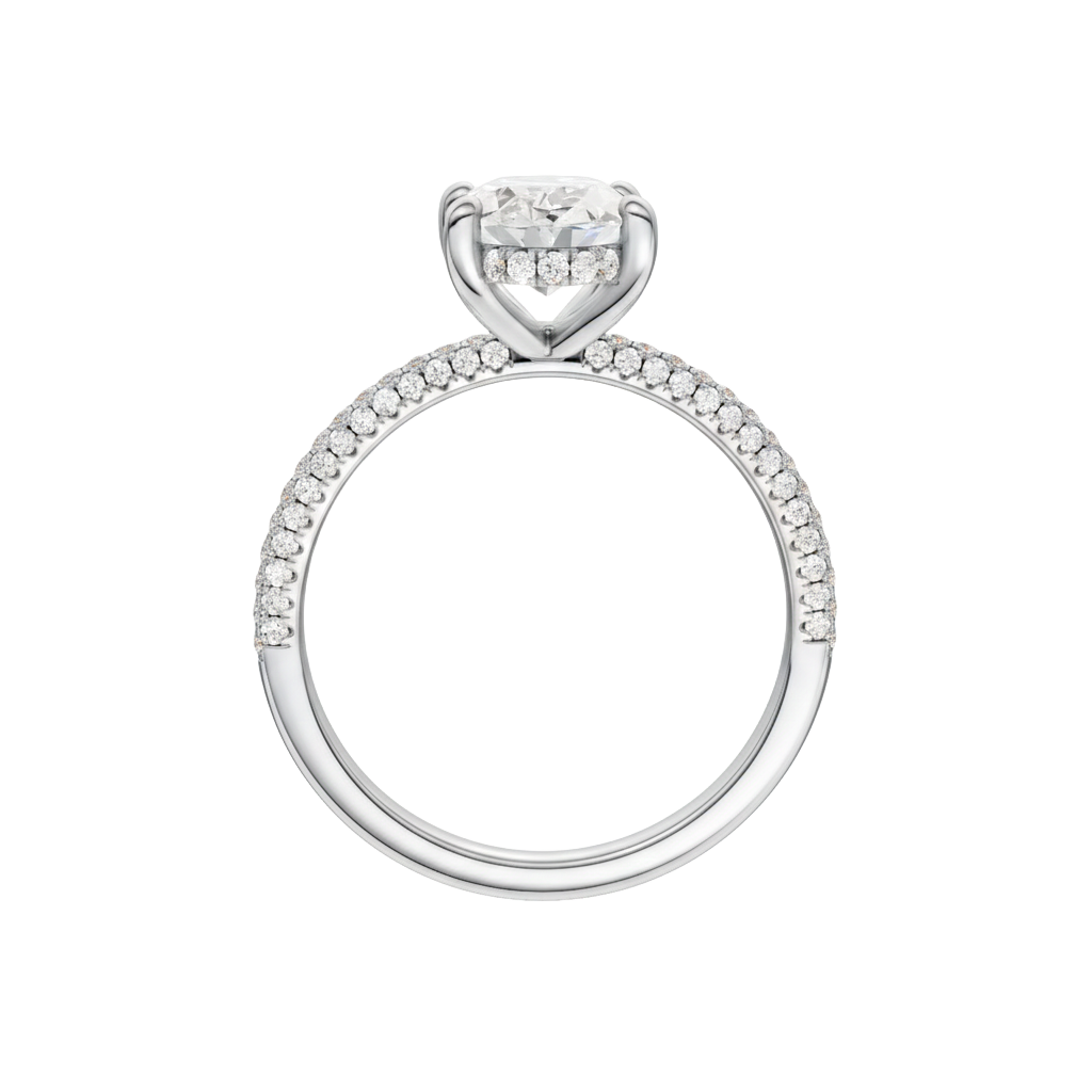 A profile view of the Oval cut diamond engagement ring in platinum with a pavé diamond band and cathedral setting