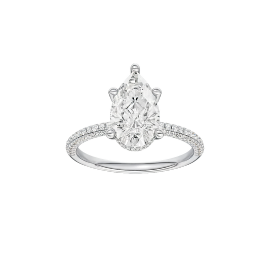 A front view of the Pear cut diamond engagement ring in 14k white gold with a pavé diamond band and cathedral setting