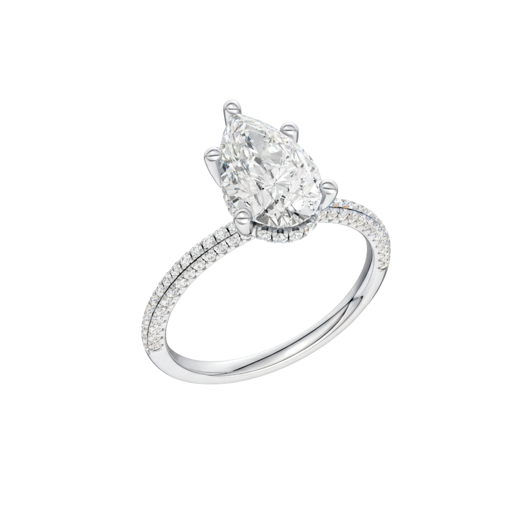 A three-quarter view of the Pear cut diamond engagement ring in 14k white gold with a pavé diamond band and cathedral setting