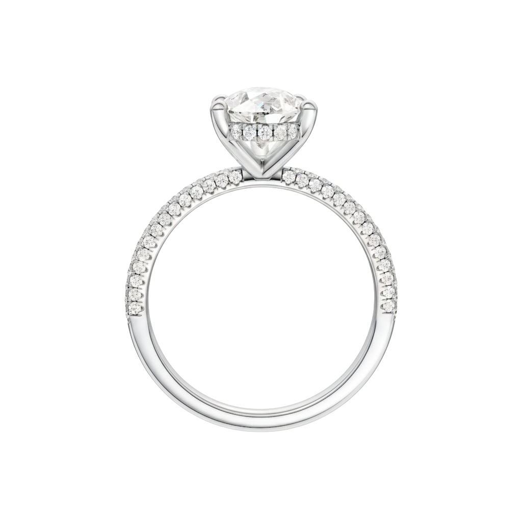 A profile view of the Pear cut diamond engagement ring in platinum with a pavé diamond band and cathedral setting