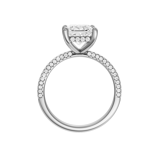A profile view of the Princess cut diamond engagement ring in platinum with a pavé diamond band and cathedral setting