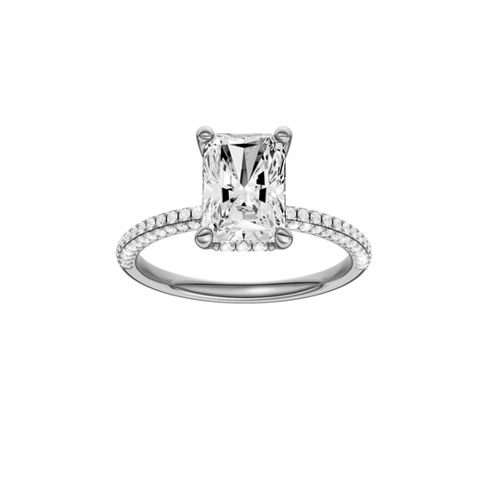 A front view of the Radiant cut diamond engagement ring in platinum with a pavé diamond band and cathedral setting