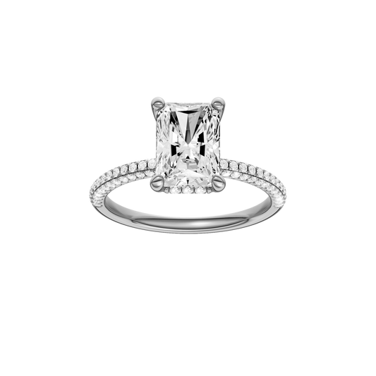 A front view of the Radiant cut diamond engagement ring in 14k white gold with a pavé diamond band and cathedral setting
