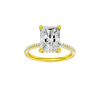 A front view of the Radiant cut diamond engagement ring in 14k yellow gold with a pavé diamond band and cathedral setting