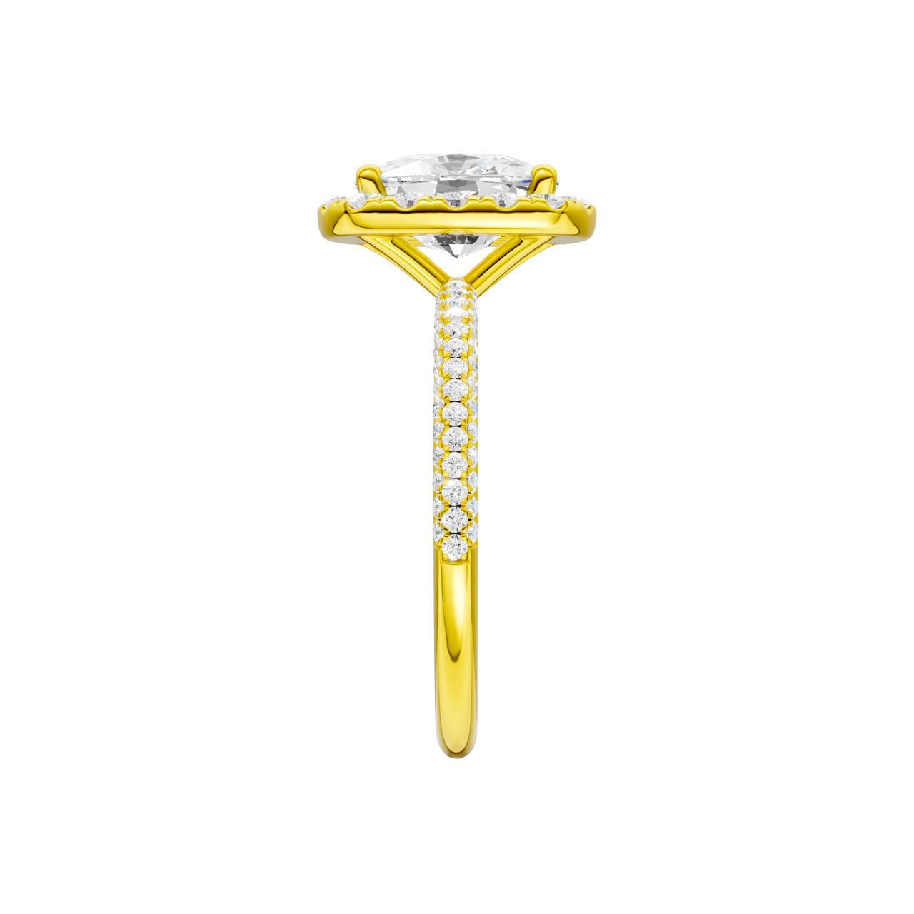 A side view of the Elongated cushion cut diamond engagement ring in 14k yellow gold with a pavé diamond band and solitaire setting