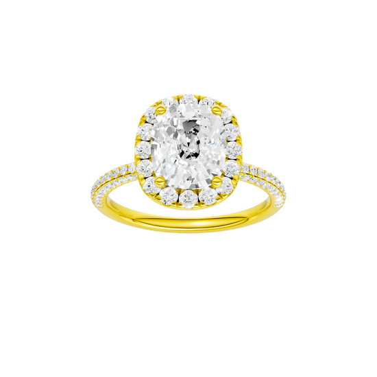A front view of the Elongated cushion cut diamond engagement ring in 14k yellow gold with a pavé diamond band and solitaire setting