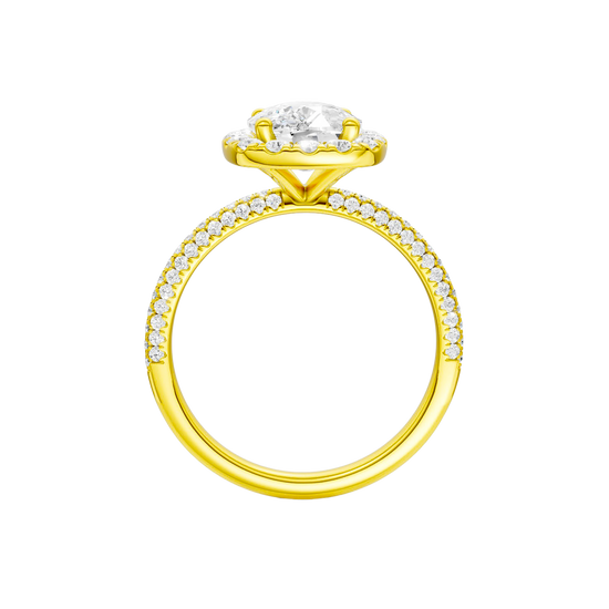 A profile view of the Elongated cushion cut diamond engagement ring in 14k yellow gold with a pavé diamond band and solitaire setting