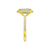 A side view of the Emerald cut diamond engagement ring in 14k yellow gold with a pavé diamond band and solitaire setting