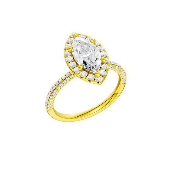 A three-quarter view of the Marquise cut diamond engagement ring in 14k yellow gold with a pavé diamond band and solitaire setting