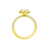 A profile view of the Marquise cut diamond engagement ring in 14k yellow gold with a pavé diamond band and solitaire setting