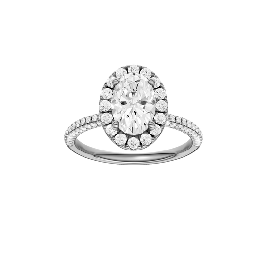A front view of the oval cut diamond engagement ring in 14k white gold with a pavé diamond band and solitaire setting
