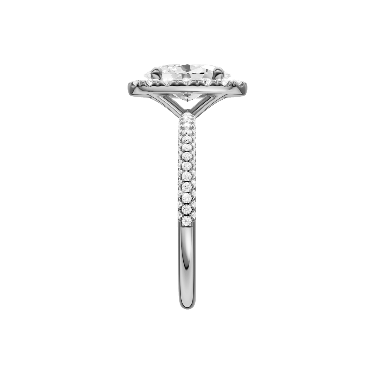 A side view of the oval cut diamond engagement ring in 14k white gold with a pavé diamond band and solitaire setting