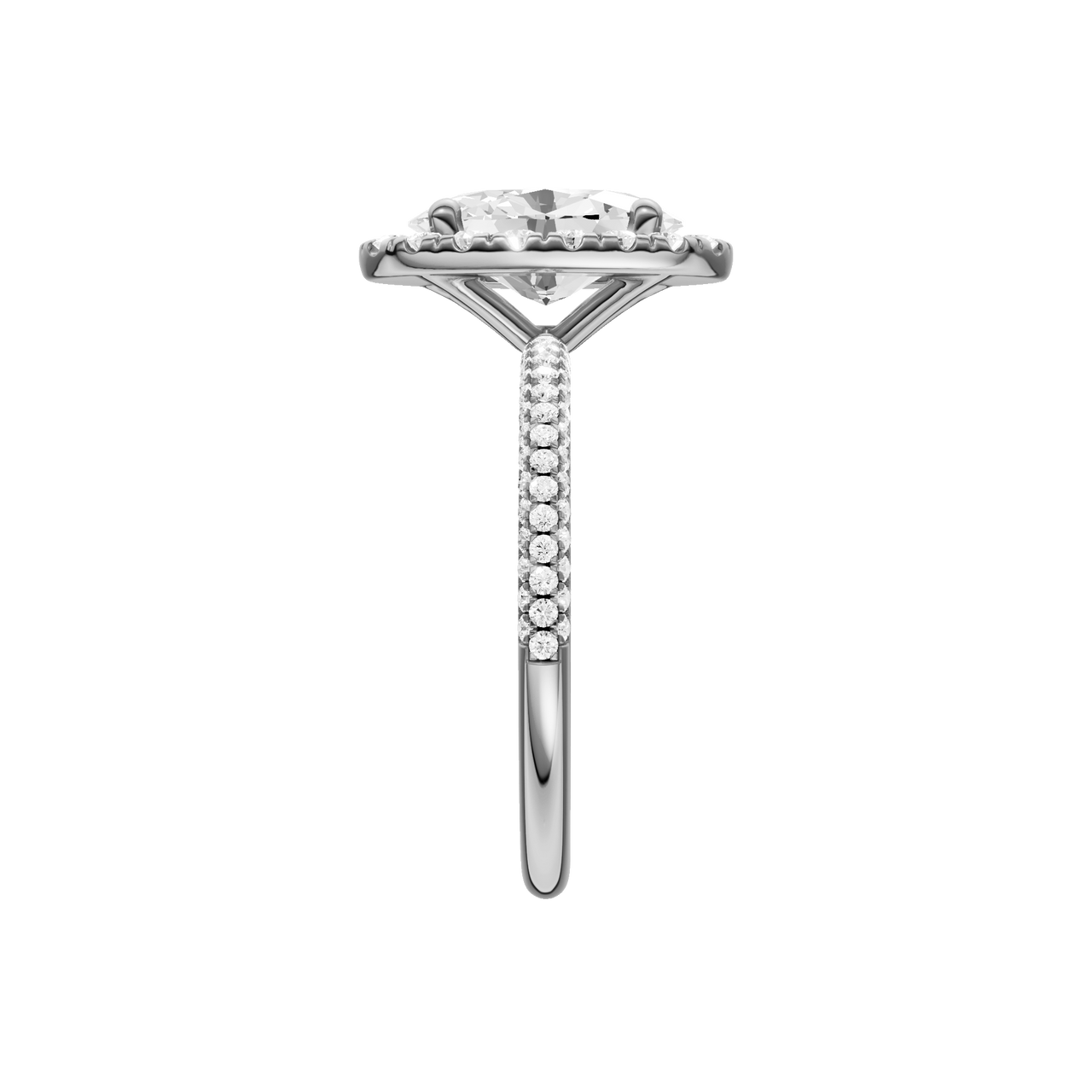 A side view of the oval cut diamond engagement ring in platinum with a pavé diamond band and solitaire setting