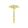A side view of the oval cut diamond engagement ring in 14k yellow gold with a pavé diamond band and solitaire setting