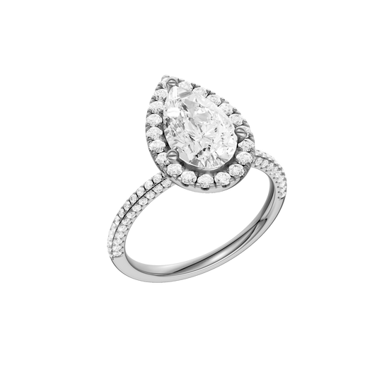 A three-quarter view of the Pear cut diamond engagement ring in 14k white gold with a pavé diamond band and solitaire setting
