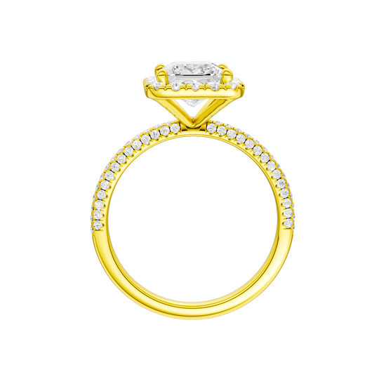 A profile view of the Princess cut diamond engagement ring in 14k yellow gold with a pavé diamond band and solitaire setting
