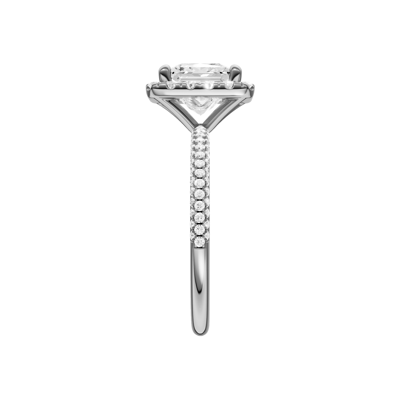 A side view of the Princess cut diamond engagement ring in platinum with a pavé diamond band and solitaire setting