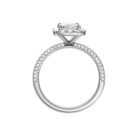 A profile view of the Radiant cut diamond engagement ring in 14k white gold with a pavé diamond band and solitaire setting