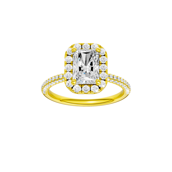 A front view of the Radiant cut diamond engagement ring in 14k yellow gold with a pavé diamond band and solitaire setting