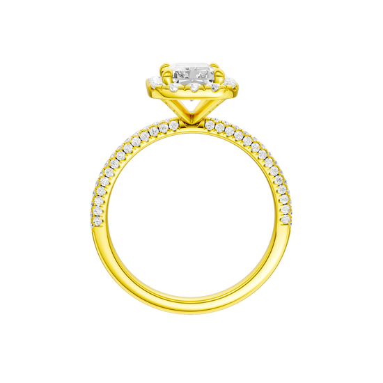 A profile view of the Radiant cut diamond engagement ring in 14k yellow gold with a pavé diamond band and solitaire setting