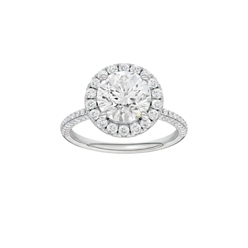 A front view of the Round cut diamond engagement ring in 14k white gold with a pavé diamond band and solitaire setting