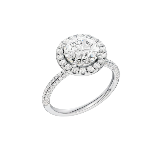 A three-quarter view of the Round cut diamond engagement ring in 14k white gold with a pavé diamond band and solitaire setting