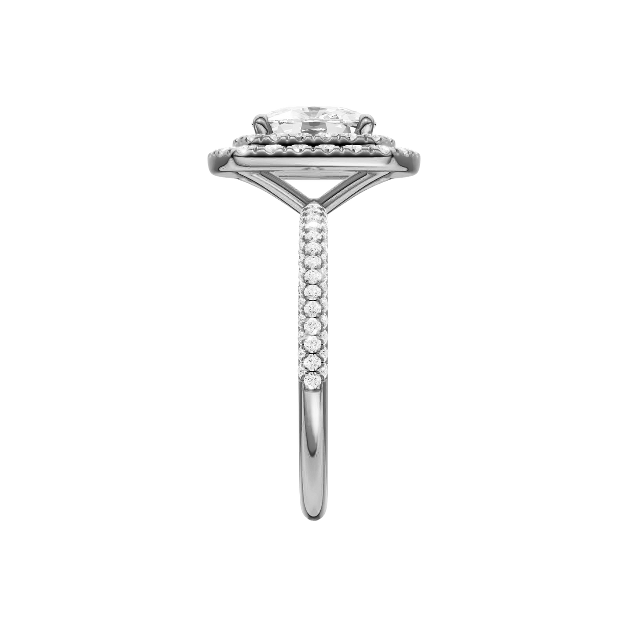 A side view of the Elongated cushion cut diamond engagement ring in platinum with a pavé diamond band and solitaire setting