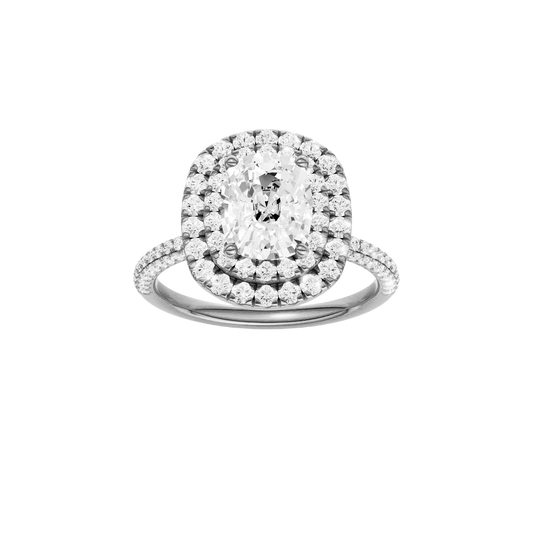 A front view of the Elongated cushion cut diamond engagement ring in 14k white gold with a pavé diamond band and solitaire setting