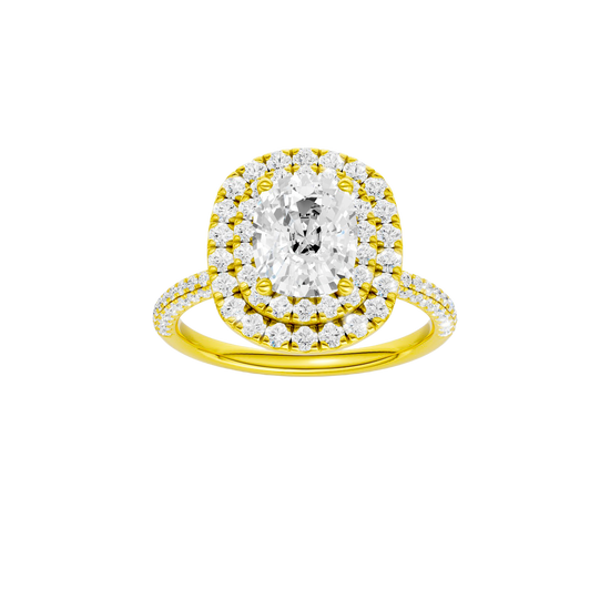 A front view of the Elongated cushion cut diamond engagement ring in 14k yellow gold with a pavé diamond band and solitaire setting