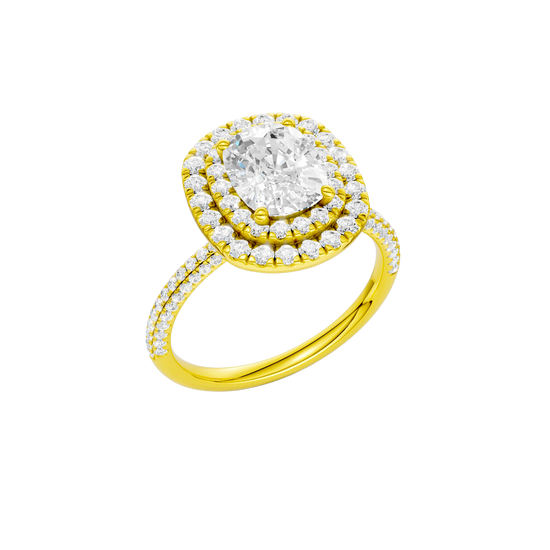 A three-quarter view of the Elongated cushion cut diamond engagement ring in 14k yellow gold with a pavé diamond band and solitaire setting