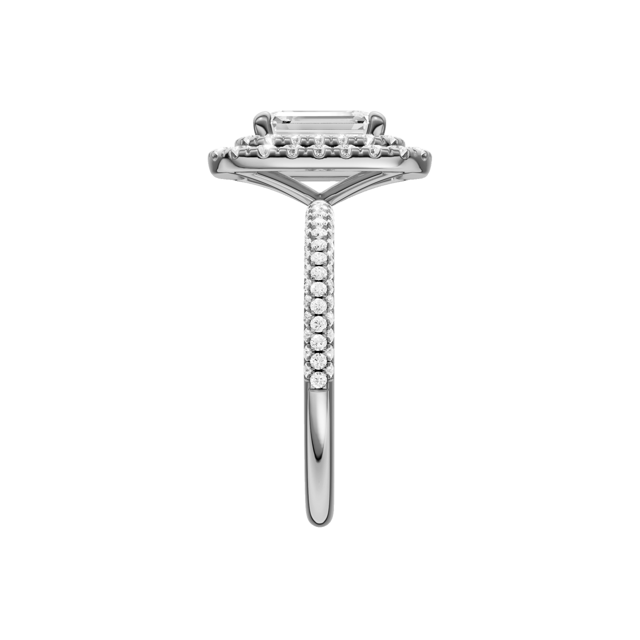 A side view of the Emerald cut diamond engagement ring in platinum with a pavé diamond band and solitaire setting