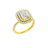 A three-quarter view of the Emerald cut diamond engagement ring in 14k yellow gold with a pavé diamond band and solitaire setting