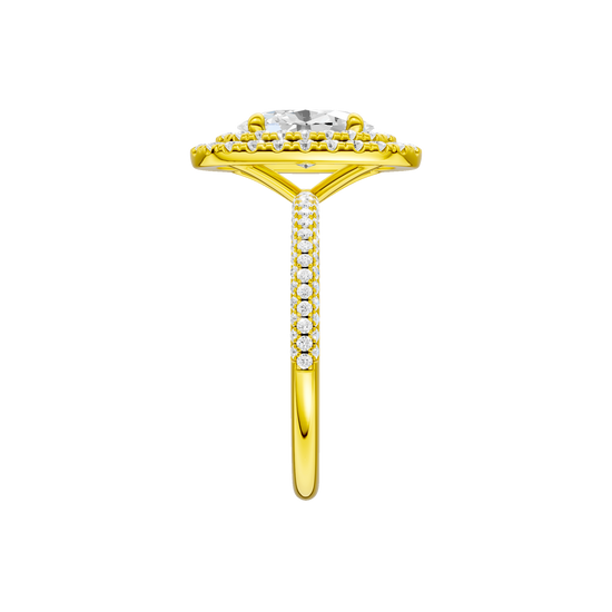 A side view of the Oval cut diamond engagement ring in 14k yellow gold with a pavé diamond band and solitaire setting