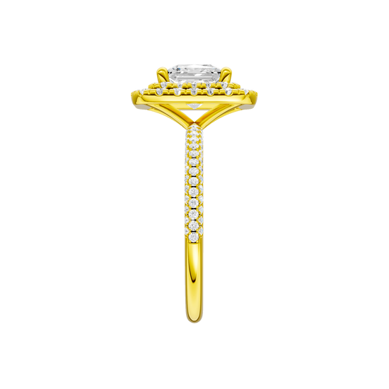 A side view of the Princess cut diamond engagement ring in 14k yellow gold with a pavé diamond band and solitaire setting