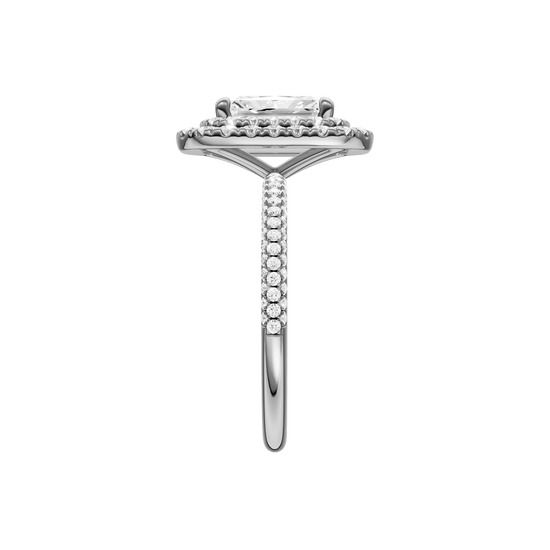 A side view of the Radiant cut diamond engagement ring in 14k white gold with a pavé diamond band and solitaire setting