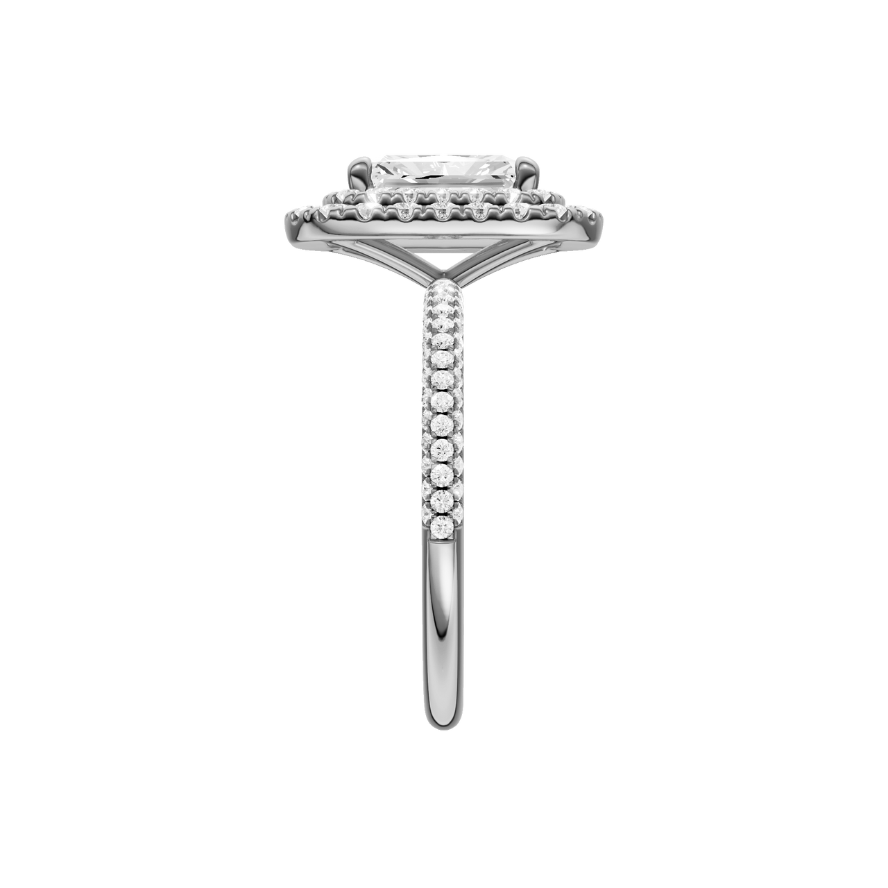 A side view of the Radiant cut diamond engagement ring in 14k white gold with a pavé diamond band and solitaire setting